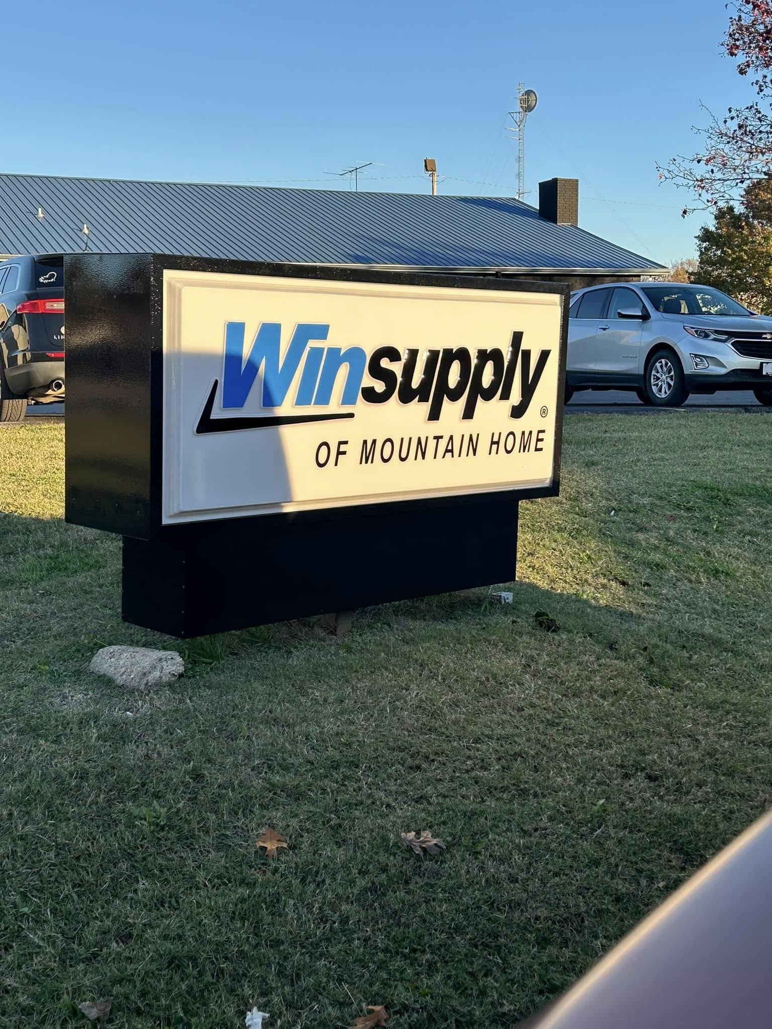 Illuminated monument sign for Winsupply of Mountain Home with blue and black lettering