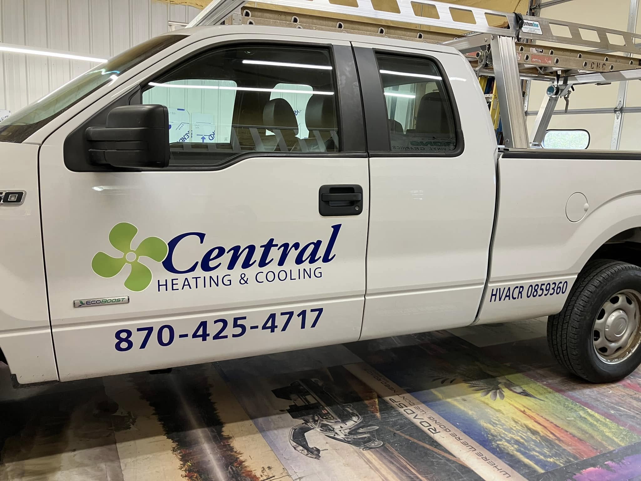 Custom vinyl graphics on white pickup truck for Central Heating & Cooling