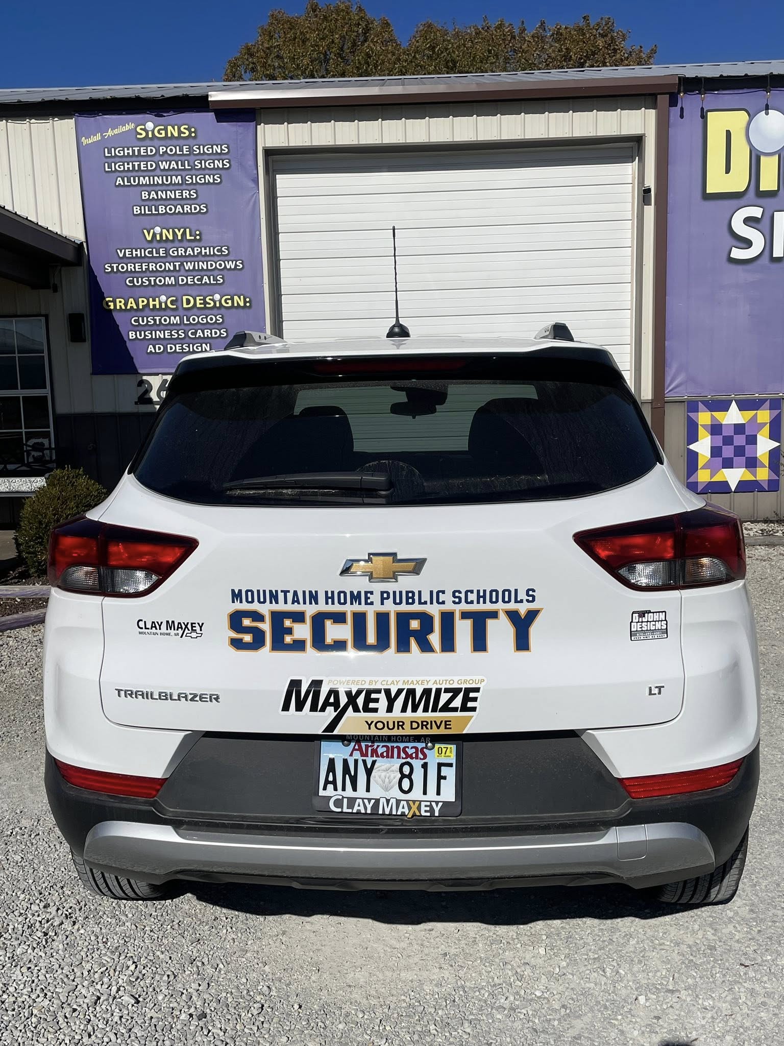 Custom vinyl graphics on white Chevrolet Trailblazer for Mountain Home Public Schools Security.