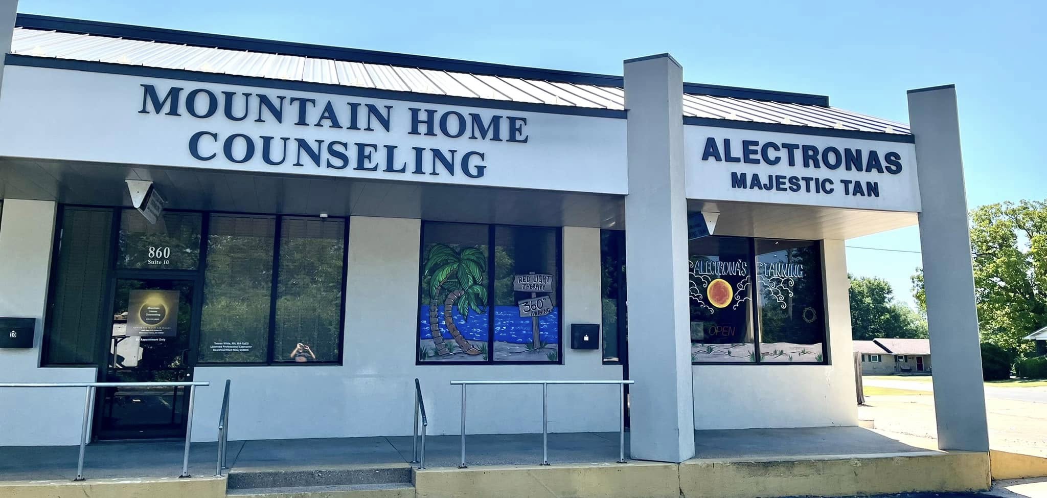 Dimensional lettering for Mountain Home Counseling and Alectronas Majestic Tan on a white building facade.