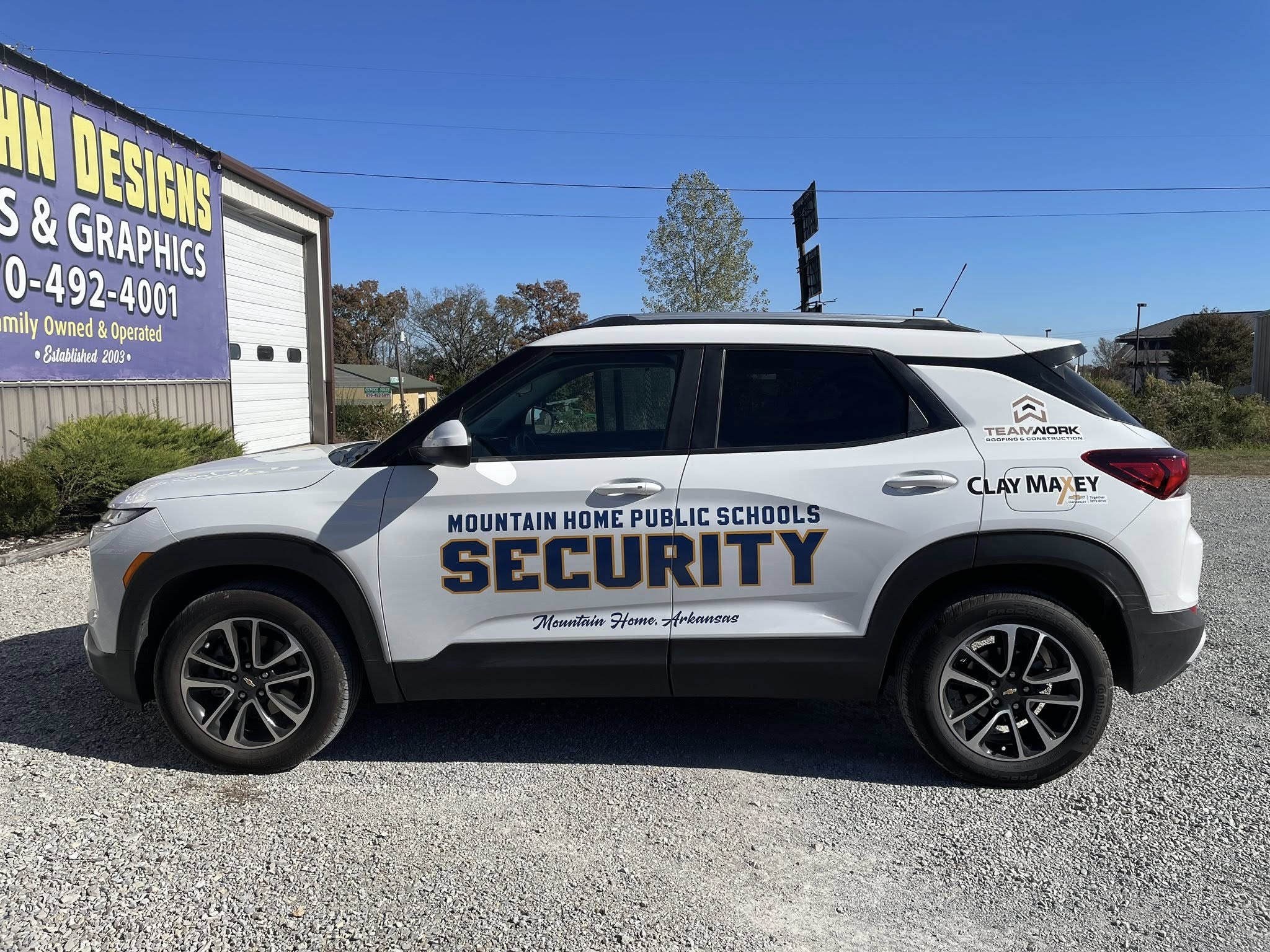 Custom vinyl graphics on white SUV for Mountain Home Public Schools Security
