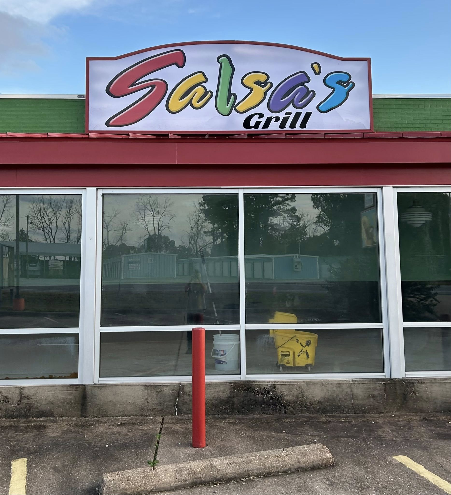 Vibrant custom LED-illuminated storefront sign for Salsa's Grill restaurant with colorful lettering.