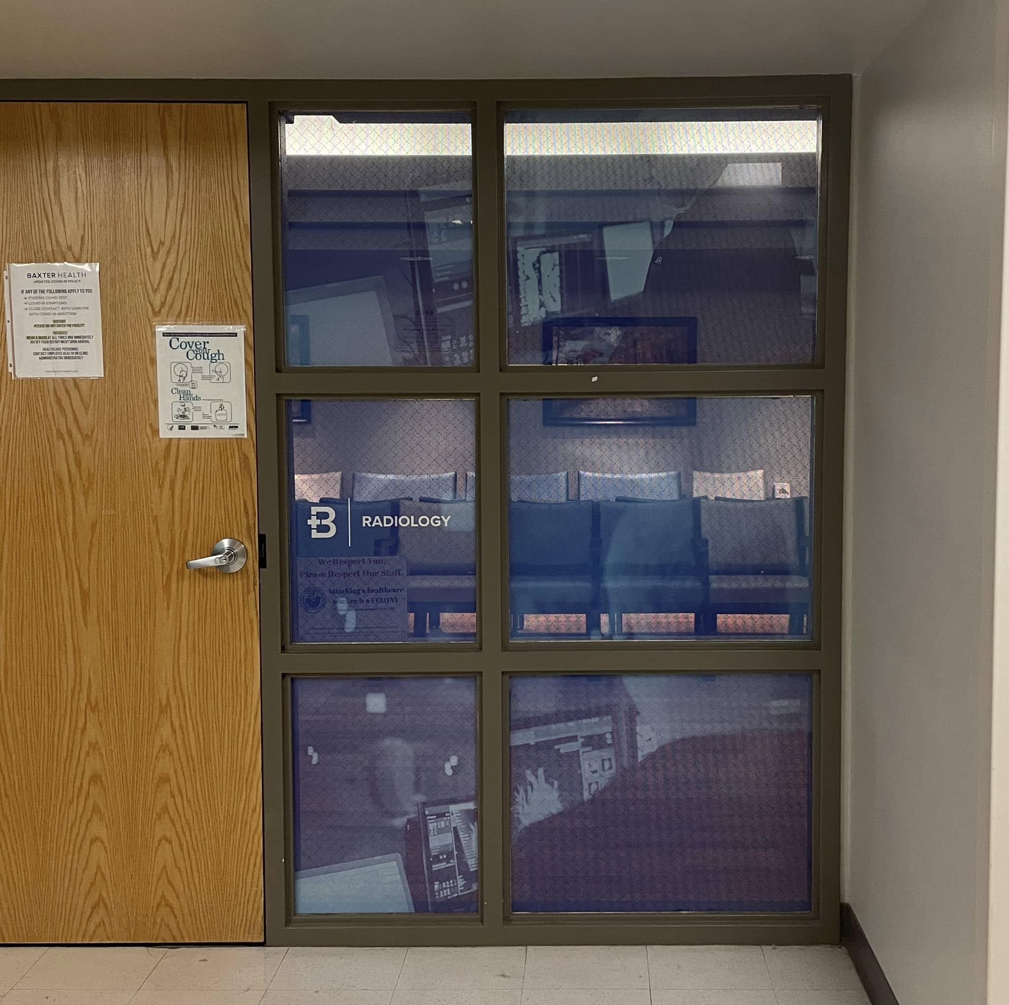 Partial privacy film and white vinyl graphics for a hospital Radiology department window display